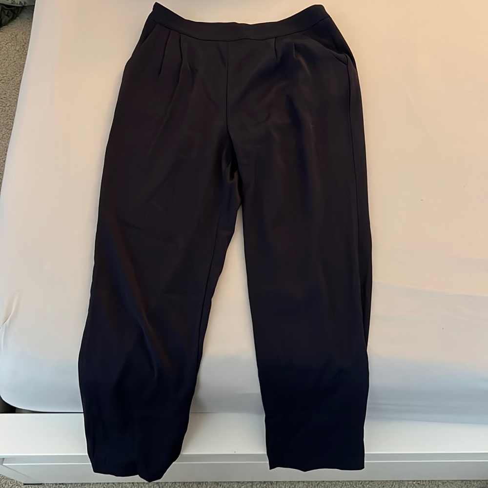 Navy blue, skinny slacks. Side zipper. Front pockets, no back pockets. Size 6